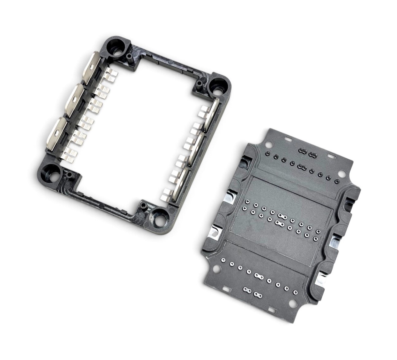 Open power module frame with precision-positioned metal insert terminals and mounting holes